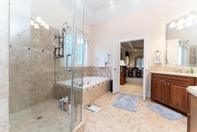 5920 Two Pines Trl, Wake Forest, NC 27587 - ensuite bathroom featuring vanity, a garden tub, a shower stall, tile patterned floors, and ornamental molding