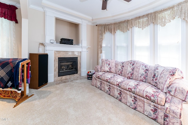 5920 Two Pines Trl, Wake Forest, NC 27587 - carpeted living room with ornamental molding, a ceiling fan, and a fireplace