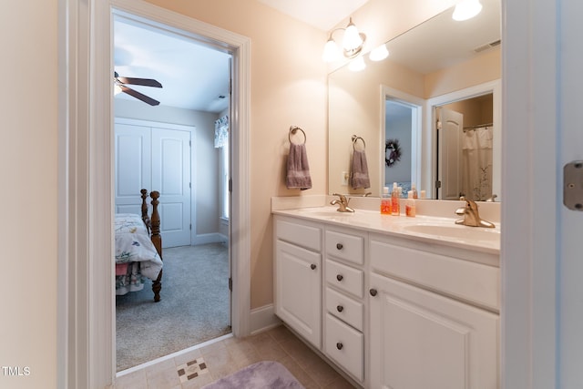 5920 Two Pines Trl, Wake Forest, NC 27587 - full bathroom featuring double vanity, ceiling fan, connected bathroom, and tile patterned floors