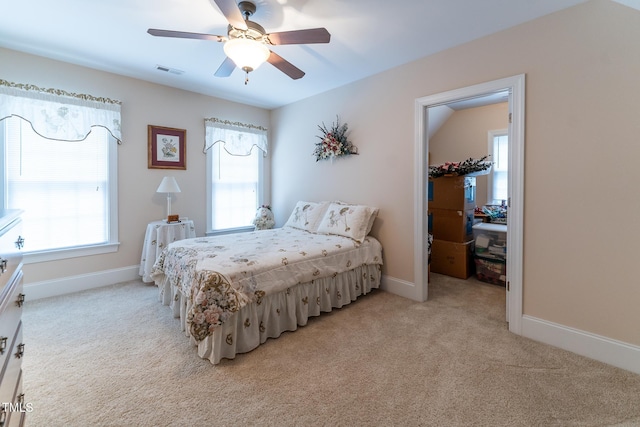 5920 Two Pines Trl, Wake Forest, NC 27587 - bedroom with light colored carpet, multiple windows, and ceiling fan