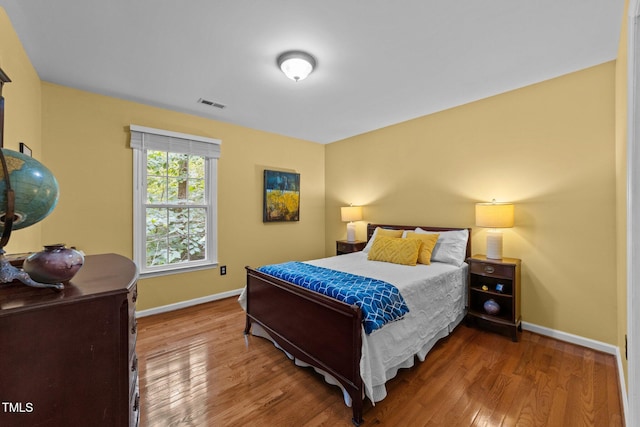308 Trappers Sack Rd, Cary, NC 27513 - bedroom with baseboards and wood finished floors