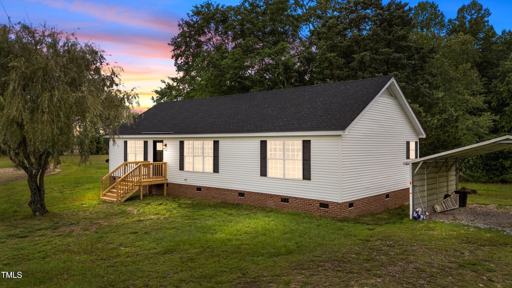 3109 Swift Creek School Rd, Whitakers, NC 27891 - manufactured / mobile home with crawl space, a front yard, driveway, roof with shingles, and a carport