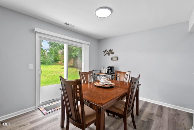 611 Quartz Dr, Durham, NC 27703 - dining room featuring wood finished floors and baseboards