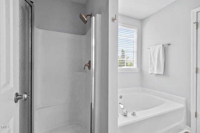 611 Quartz Dr, Durham, NC 27703 - full bathroom featuring a garden tub and a stall shower