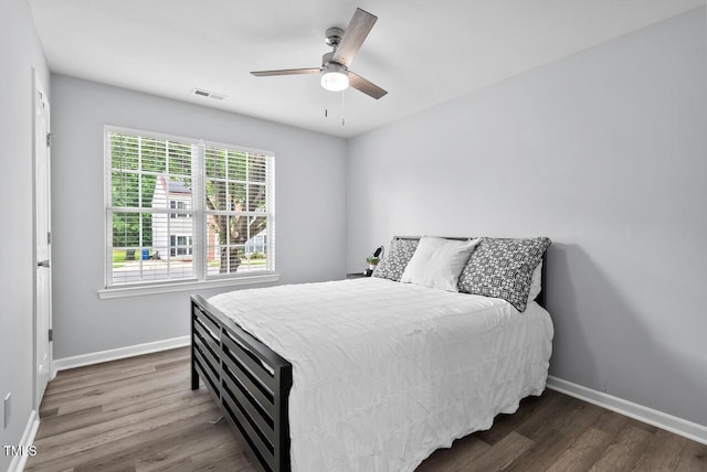 611 Quartz Dr, Durham, NC 27703 - bedroom with wood finished floors and ceiling fan