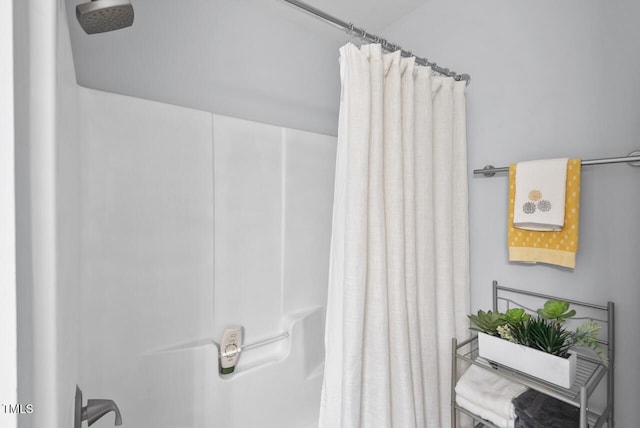 611 Quartz Dr, Durham, NC 27703 - full bathroom featuring a shower with shower curtain