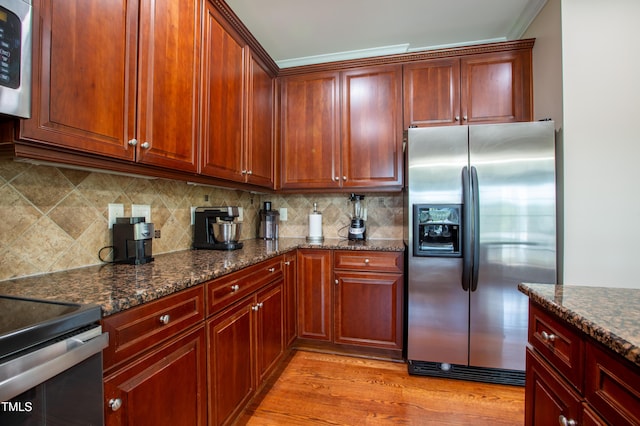 9701 Corktree Ct, Wake Forest, NC 27587 - kitchen with stainless steel fridge, backsplash, dark stone counters, and light wood finished floors