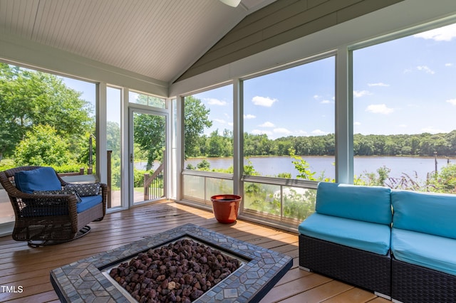 9701 Corktree Ct, Wake Forest, NC 27587 - sunroom with a water view, lofted ceiling, plenty of natural light, view of wooded area, and outdoor lounge area