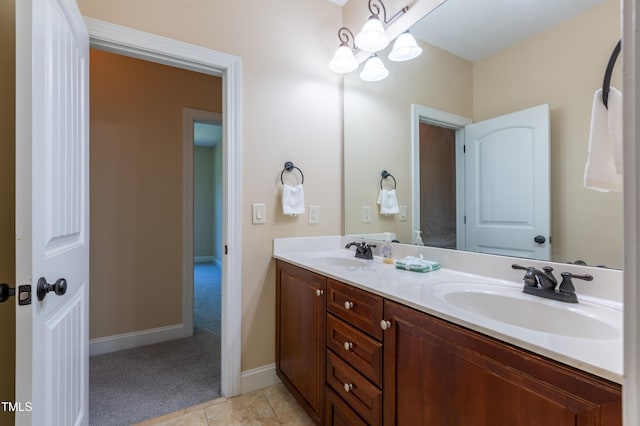 9701 Corktree Ct, Wake Forest, NC 27587 - bathroom featuring double vanity and a chandelier