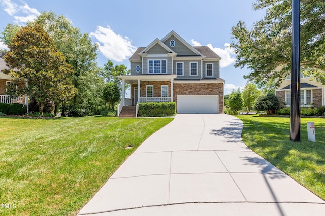 9701 Corktree Ct, Wake Forest, NC 27587 - craftsman-style house with covered porch, stone siding, a garage, concrete driveway, and a front lawn