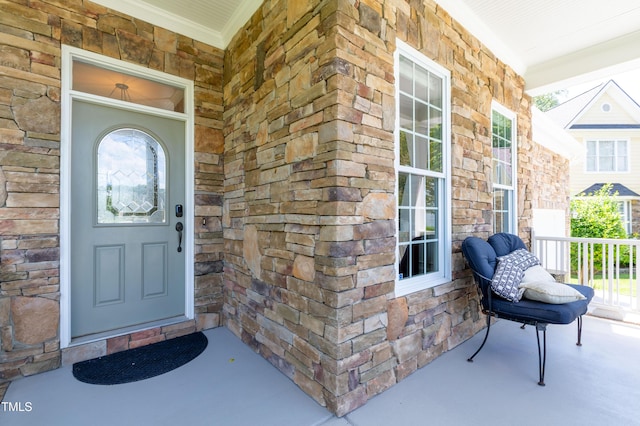 9701 Corktree Ct, Wake Forest, NC 27587 - doorway to property with covered porch and stone siding