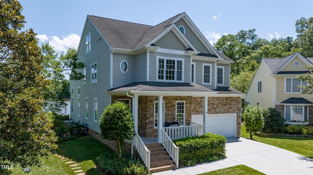 9701 Corktree Ct, Wake Forest, NC 27587 - craftsman-style home featuring a porch, a garage, driveway, and a front lawn