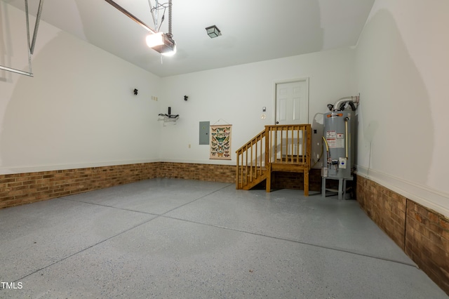 9701 Corktree Ct, Wake Forest, NC 27587 - garage featuring gas water heater, a garage door opener, electric panel, and a wainscoted wall