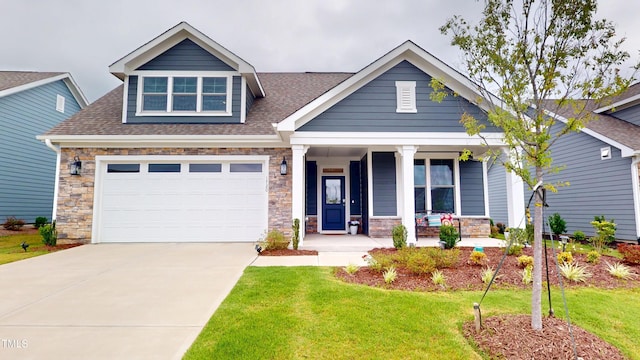 1720 Pinecliff Ct, Fuquay Varina, NC 27526 - craftsman-style house with a porch, stone siding, concrete driveway, and a front lawn