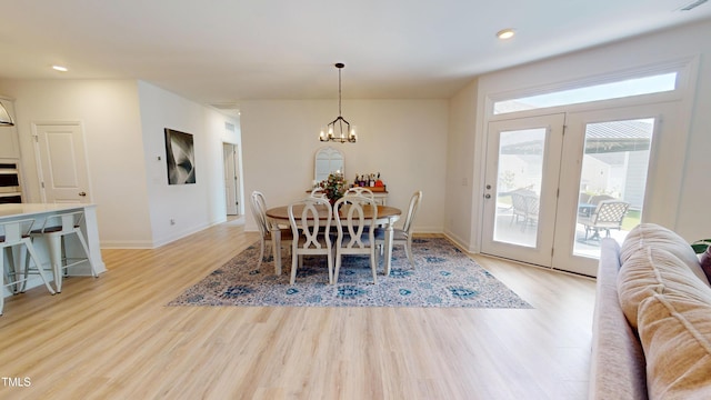 1720 Pinecliff Ct, Fuquay Varina, NC 27526 - dining area with light wood finished floors, a chandelier, and recessed lighting