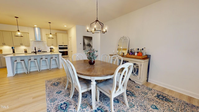 1720 Pinecliff Ct, Fuquay Varina, NC 27526 - dining room with light wood-style floors, a chandelier, and recessed lighting
