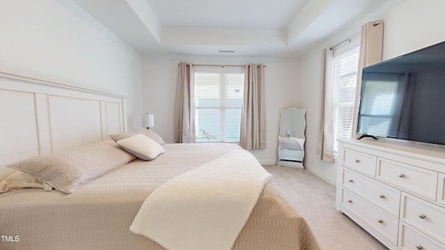1720 Pinecliff Ct, Fuquay Varina, NC 27526 - bedroom with light carpet and a tray ceiling