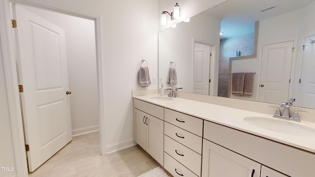 1720 Pinecliff Ct, Fuquay Varina, NC 27526 - full bathroom with double vanity, a shower, and tile patterned flooring