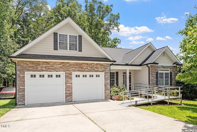 23 Northern Way Ct, Durham, NC 27712 - view of front of house featuring stone siding, driveway, and a shingled roof