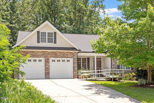 23 Northern Way Ct, Durham, NC 27712 - view of front of property featuring stone siding, concrete driveway, covered porch, and roof with shingles