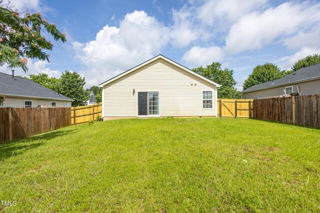 418 Lodestone Dr, Durham, NC 27703 - back of property with a fenced backyard