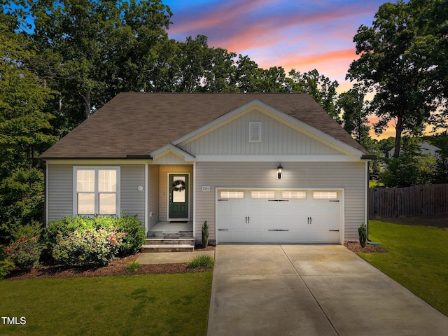 2321 Blue Crab Ct, Wake Forest, NC 27587 - view of front of house with concrete driveway, a garage, and board and batten siding