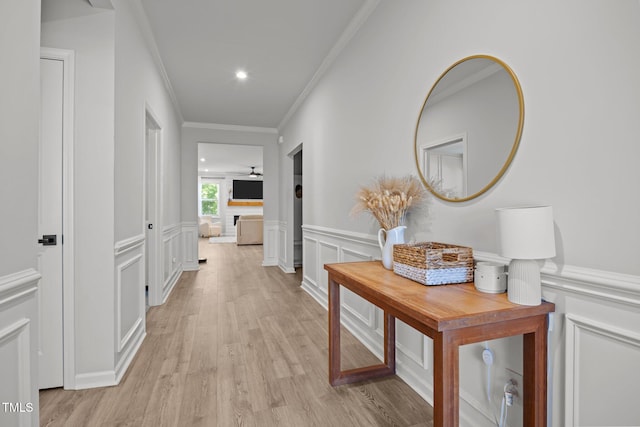 2321 Blue Crab Ct, Wake Forest, NC 27587 - corridor with a decorative wall, light wood finished floors, ornamental molding, wainscoting, and recessed lighting