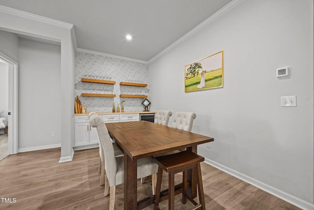 2321 Blue Crab Ct, Wake Forest, NC 27587 - dining area featuring crown molding, light wood-style flooring, and recessed lighting