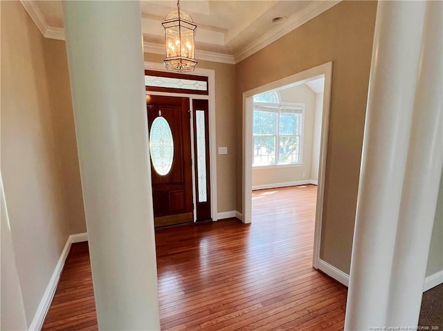 333 Westwater Way, Fayetteville, NC 28301 - entryway featuring hardwood / wood-style flooring, a chandelier, ornamental molding, and a raised ceiling