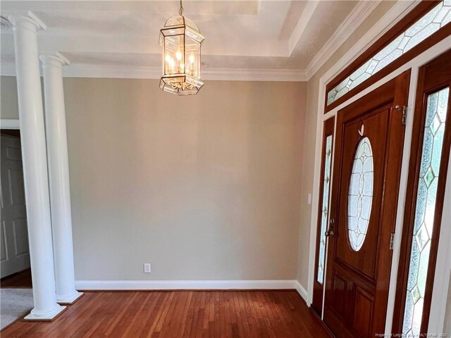 333 Westwater Way, Fayetteville, NC 28301 - entryway featuring dark wood-style flooring, crown molding, and a chandelier