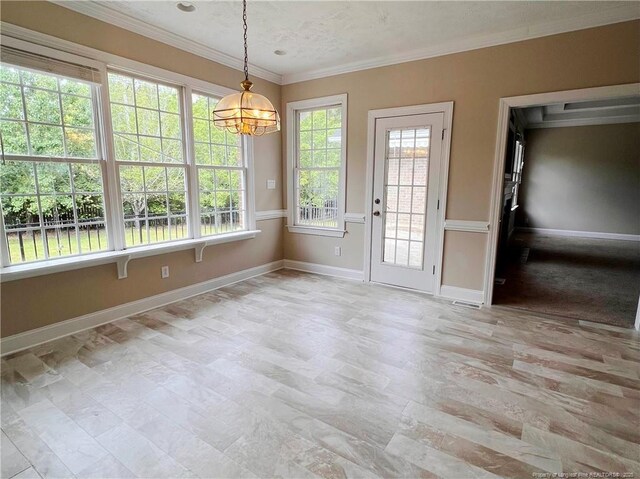 333 Westwater Way, Fayetteville, NC 28301 - unfurnished dining area with a chandelier and crown molding