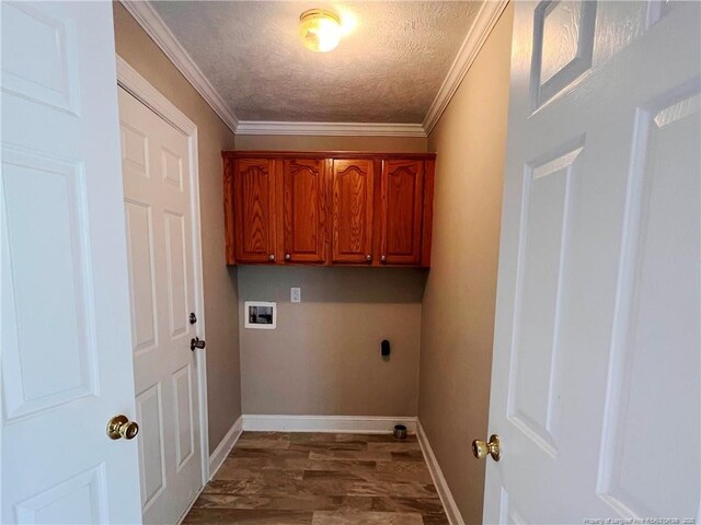 333 Westwater Way, Fayetteville, NC 28301 - laundry area featuring hookup for a washing machine, electric dryer hookup, a textured ceiling, crown molding, and cabinet space
