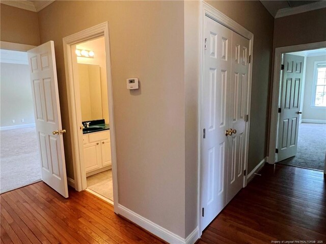 333 Westwater Way, Fayetteville, NC 28301 - corridor featuring hardwood / wood-style flooring and ornamental molding