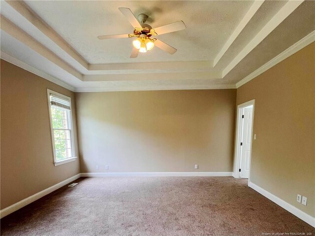 333 Westwater Way, Fayetteville, NC 28301 - carpeted spare room featuring a tray ceiling, ceiling fan, and crown molding