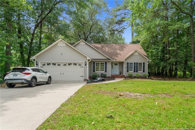 40 Blue Heron Ct, Sanford, NC 27332 - ranch-style home with an attached garage, driveway, and a front yard