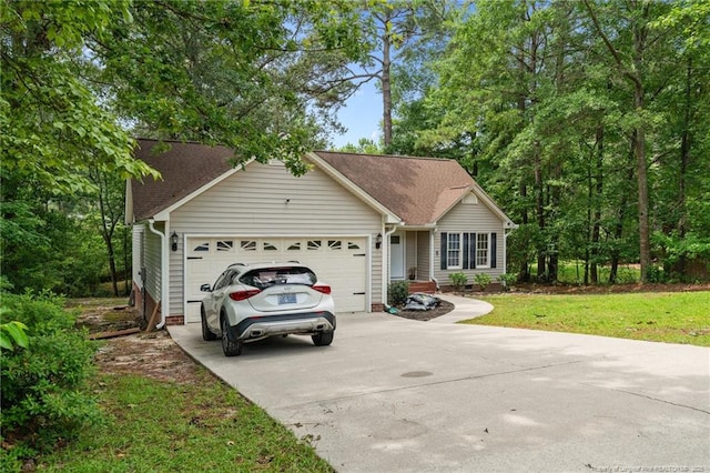 40 Blue Heron Ct, Sanford, NC 27332 - view of front facade featuring a garage and driveway