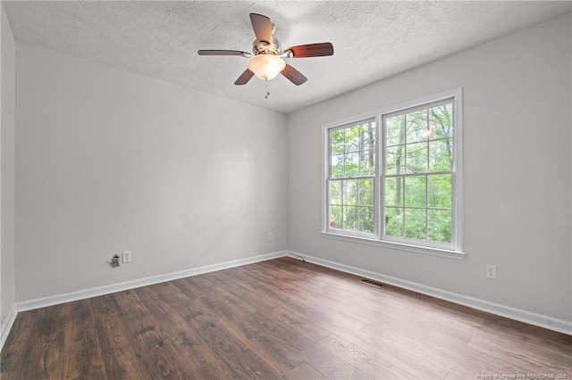 40 Blue Heron Ct, Sanford, NC 27332 - empty room featuring wood finished floors, a textured ceiling, and a ceiling fan