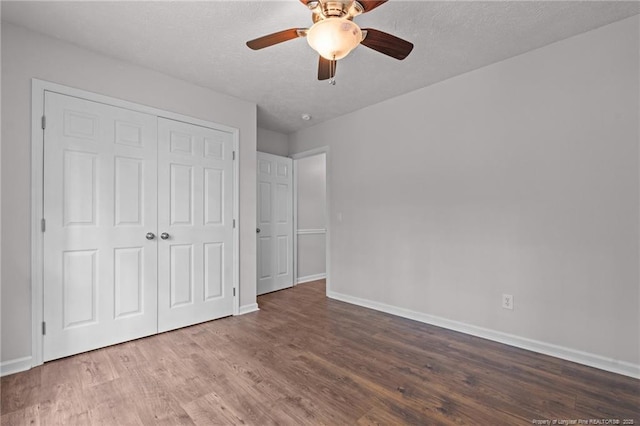 40 Blue Heron Ct, Sanford, NC 27332 - unfurnished bedroom featuring wood finished floors, a closet, a ceiling fan, and a textured ceiling