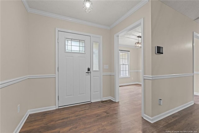 40 Blue Heron Ct, Sanford, NC 27332 - foyer entrance with dark wood finished floors, plenty of natural light, crown molding, and a textured ceiling