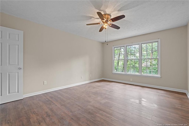 40 Blue Heron Ct, Sanford, NC 27332 - spare room with a ceiling fan, a textured ceiling, and wood finished floors