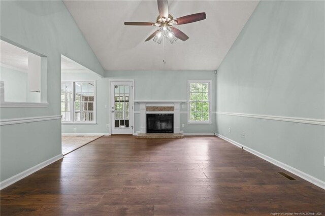40 Blue Heron Ct, Sanford, NC 27332 - unfurnished living room featuring lofted ceiling, healthy amount of natural light, ceiling fan, and wood finished floors