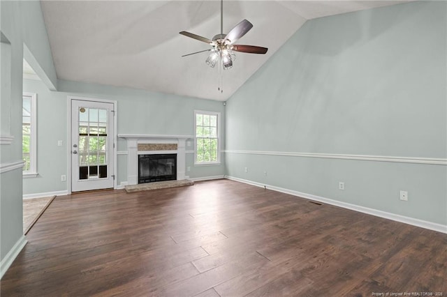 40 Blue Heron Ct, Sanford, NC 27332 - unfurnished living room featuring a ceiling fan, high vaulted ceiling, wood finished floors, and a glass covered fireplace