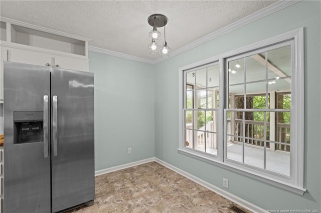 40 Blue Heron Ct, Sanford, NC 27332 - kitchen featuring stainless steel fridge, crown molding, a textured ceiling, and white cabinets