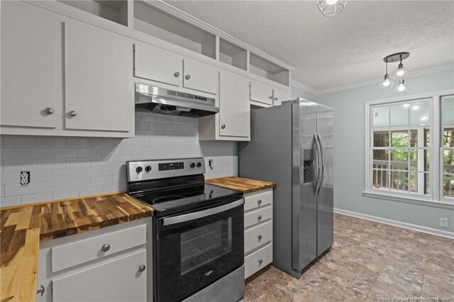 40 Blue Heron Ct, Sanford, NC 27332 - kitchen with stainless steel appliances, under cabinet range hood, butcher block countertops, backsplash, and crown molding