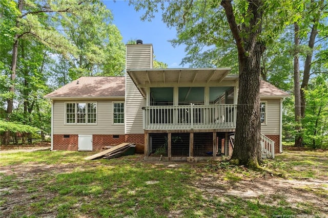40 Blue Heron Ct, Sanford, NC 27332 - rear view of property with crawl space, a chimney, a deck, and a shingled roof