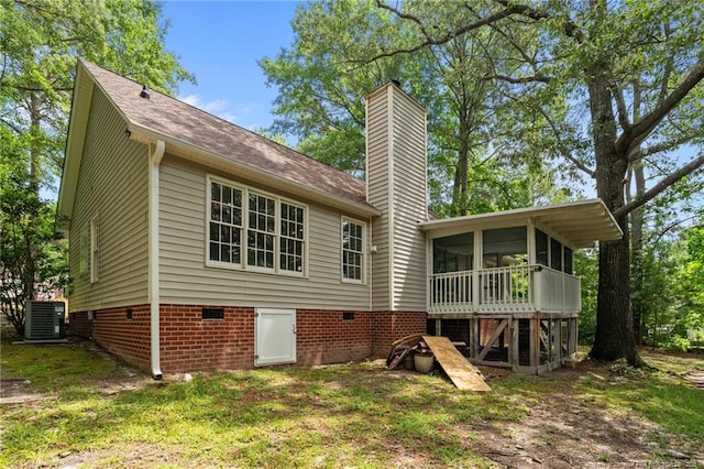 40 Blue Heron Ct, Sanford, NC 27332 - back of property with a sunroom, crawl space, and a chimney