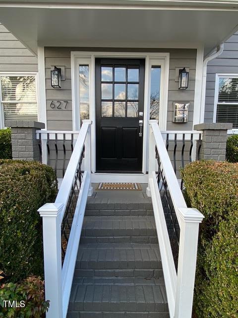 627 New Rd, Raleigh, NC 27608 - property entrance with covered porch