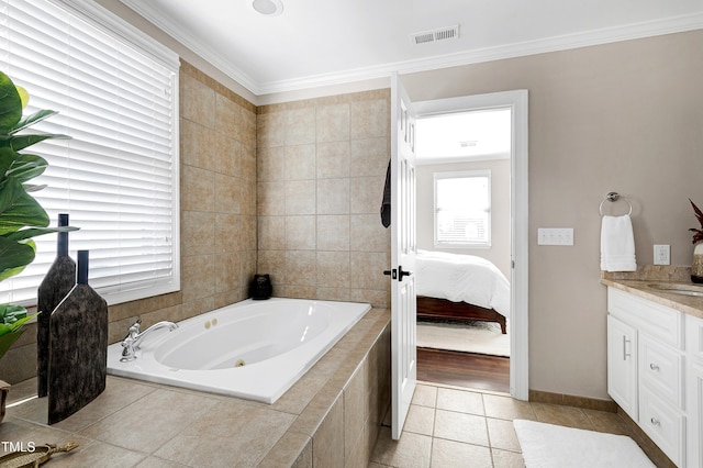 627 New Rd, Raleigh, NC 27608 - ensuite bathroom featuring a tub with jets, vanity, tile patterned floors, and crown molding
