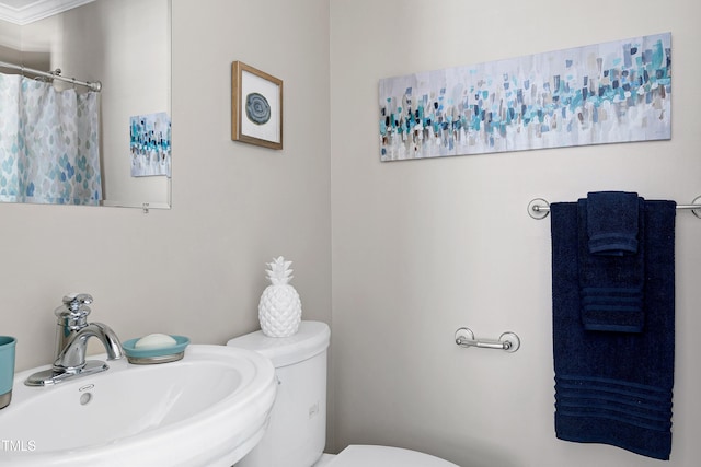 627 New Rd, Raleigh, NC 27608 - bathroom with a sink and a shower with curtain