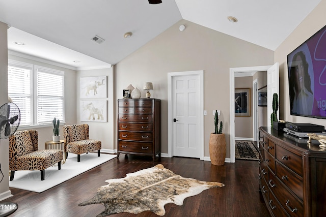 627 New Rd, Raleigh, NC 27608 - living area with vaulted ceiling and wood finished floors